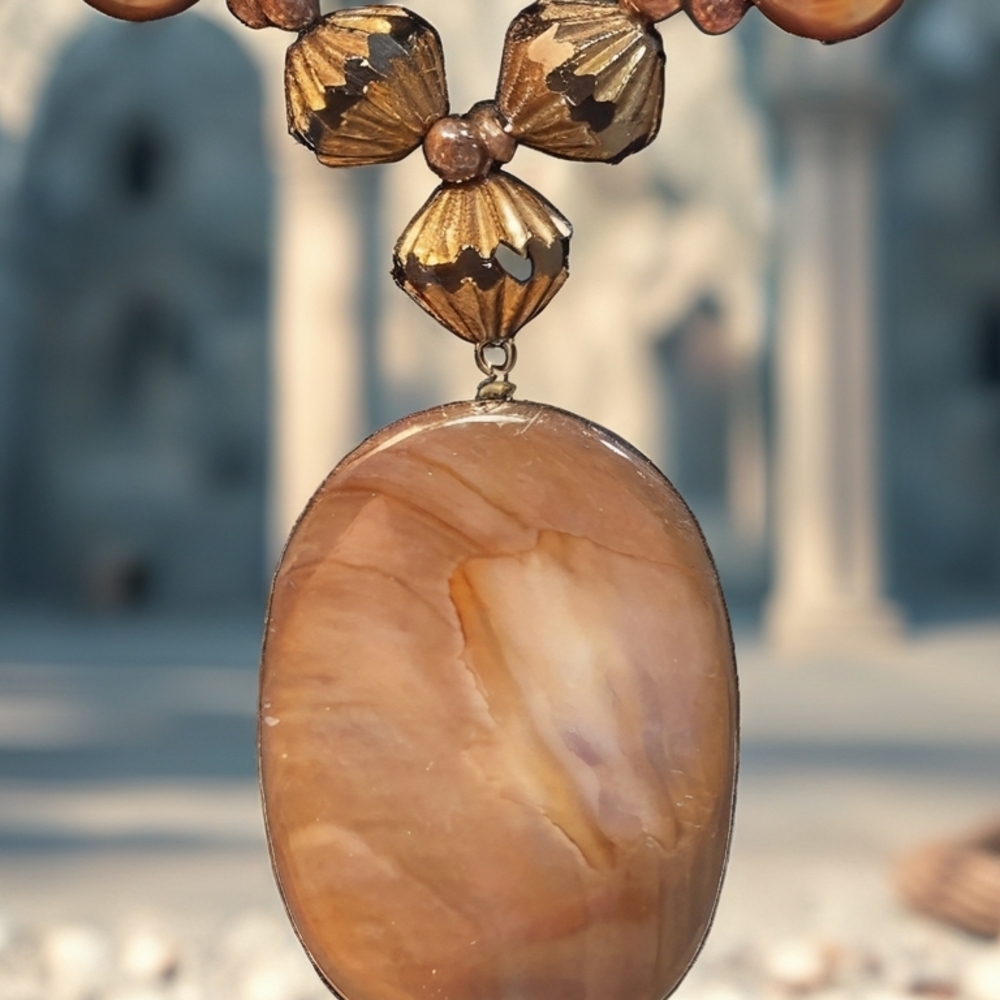 Gold and Brown Necklace with Striking Pendant Design